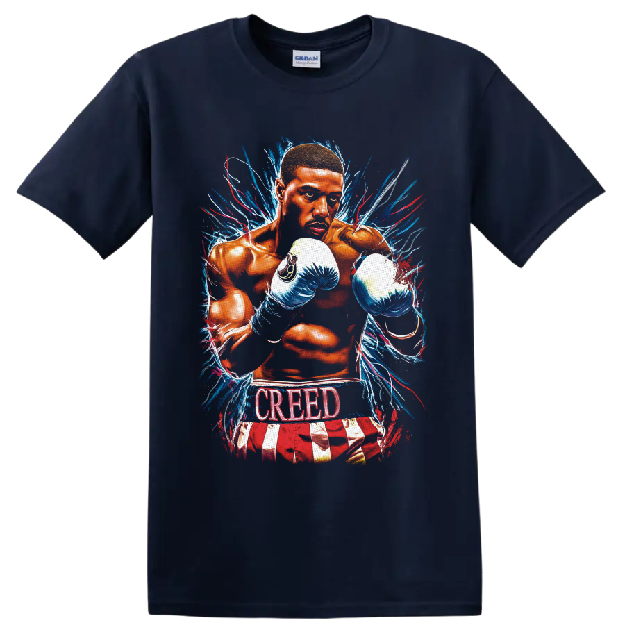 Adonis Creed boxing illustration with blue gloves, paint bursts, and CREED text on a Navy (Blue) T Shirt