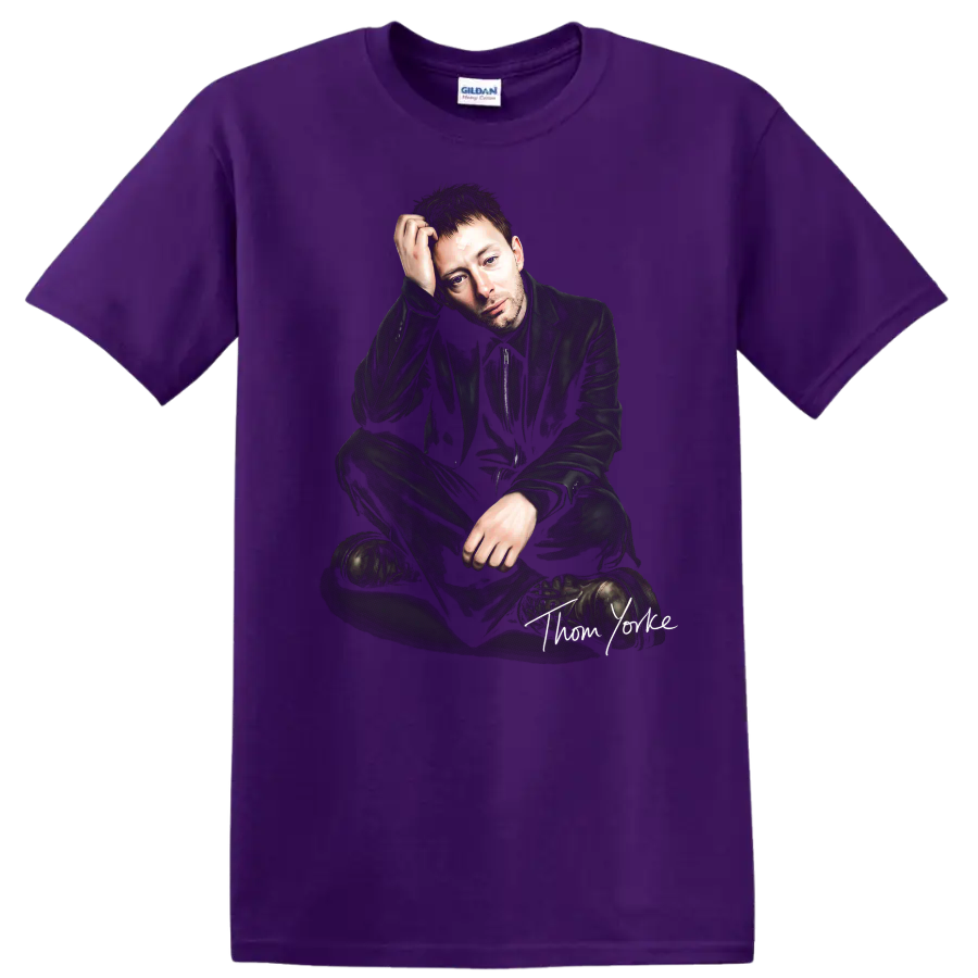 Thom Yorke seated portrait with handwritten signature, dark alternative rock style on a Purple T Shirt