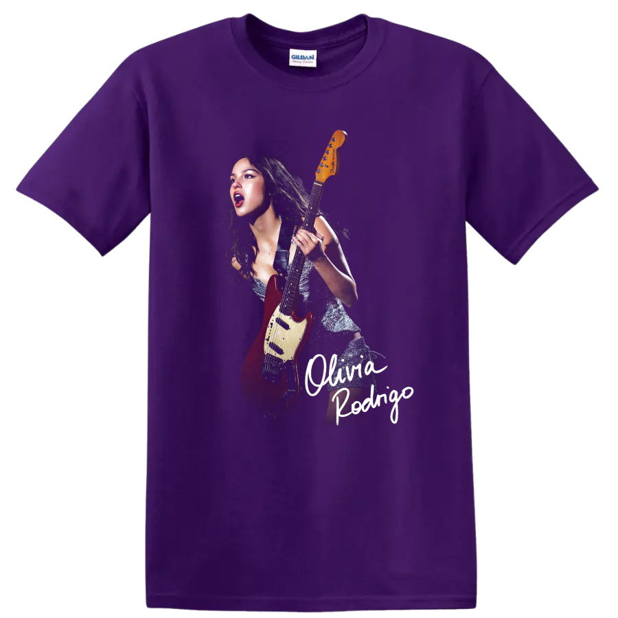 Olivia Rodrigo performing with red electric guitar and handwritten name design on a Purple T Shirt