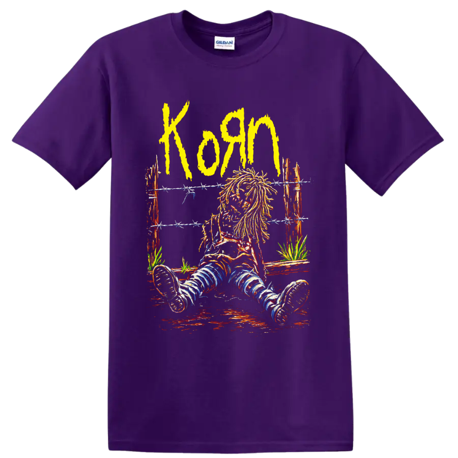 Korn yellow wordmark and seated long-haired figure behind barbed wire on a Purple T Shirt