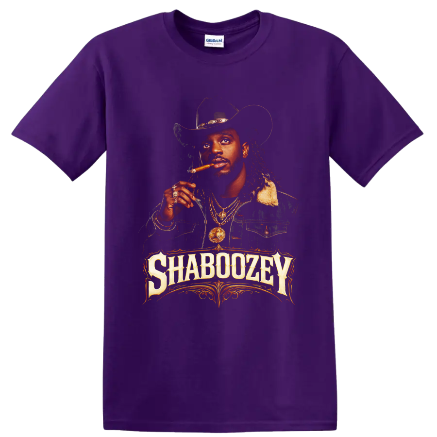 Shaboozey cowboy hat portrait with cigar, gold chains, and ornate western lettering on a Purple T Shirt