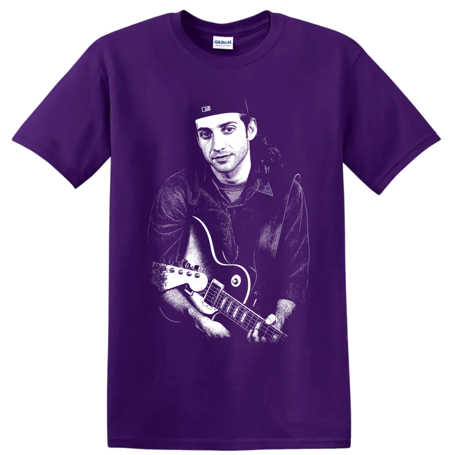 High-contrast monochrome portrait of Stone Gossard playing guitar on a Purple T Shirt