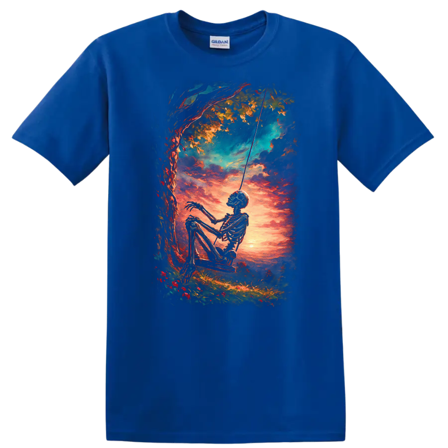 Vintage gothic skeleton on a swing beneath a tree at a vivid sunset on a Royal (Blue) T Shirt